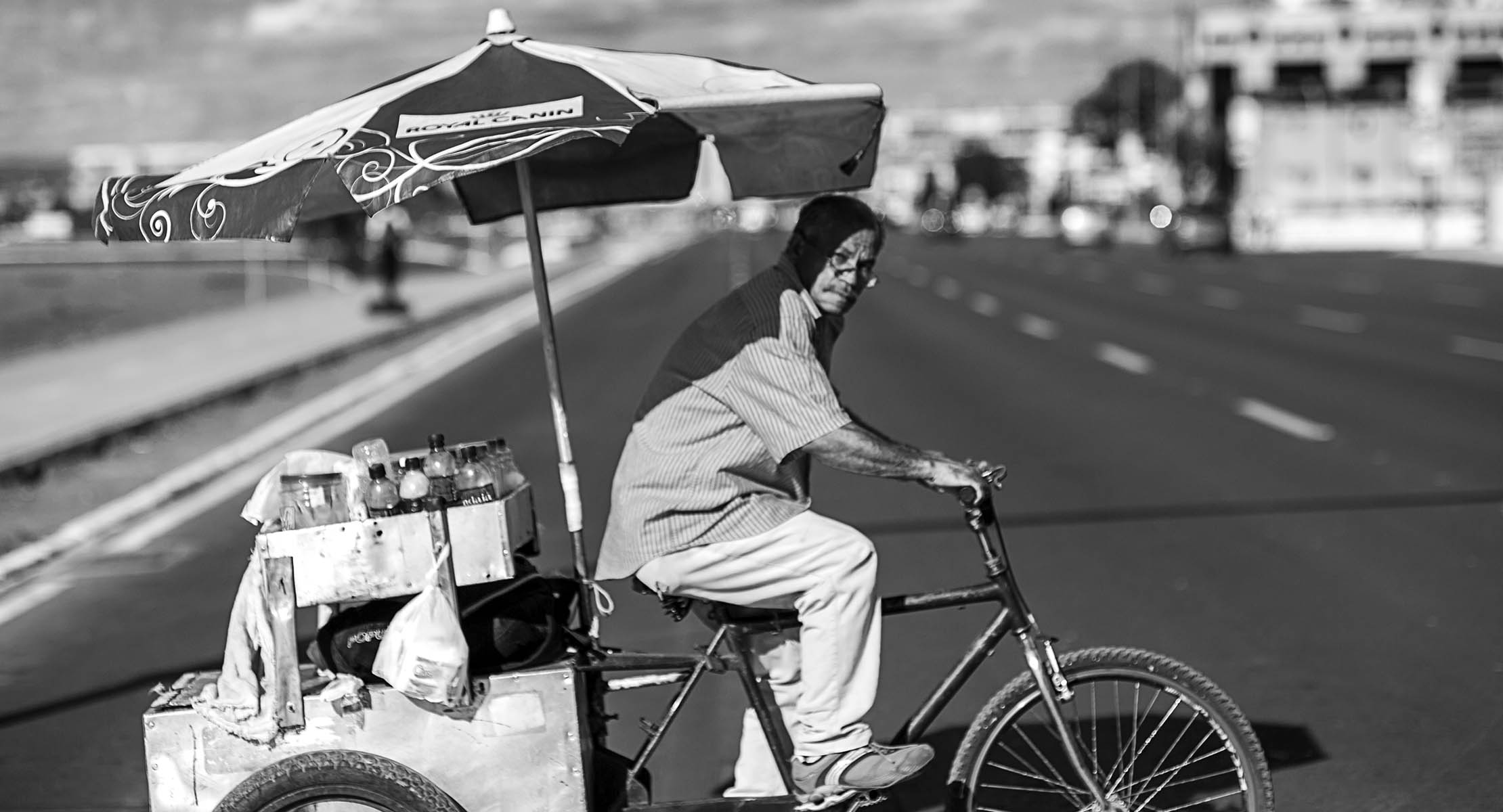 Mike Blume, Man on Bicycle in Brasília, Brasil, 2014